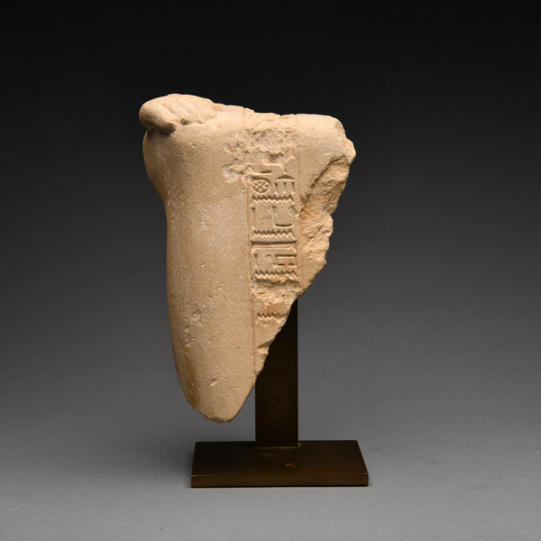Egyptian Limestone Fragment of a Seated Figure