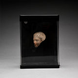 Fragmentary Egyptian Painted Limestone Head of an Official